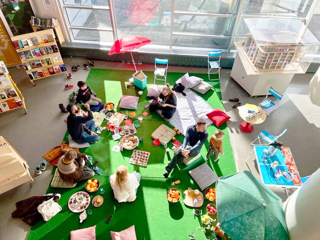 a group doing an indoor picnic