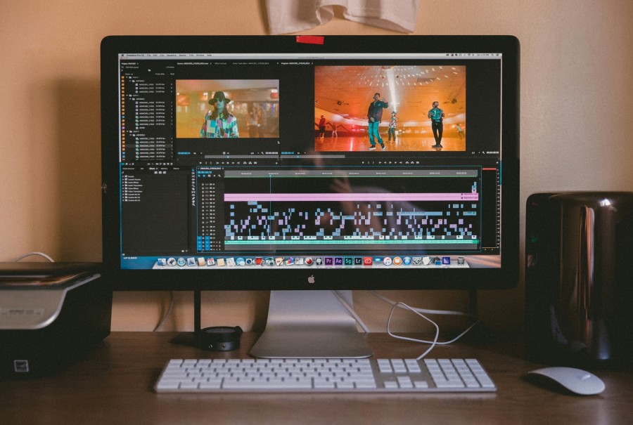 Final Cut Pro iMac video editing on a desk