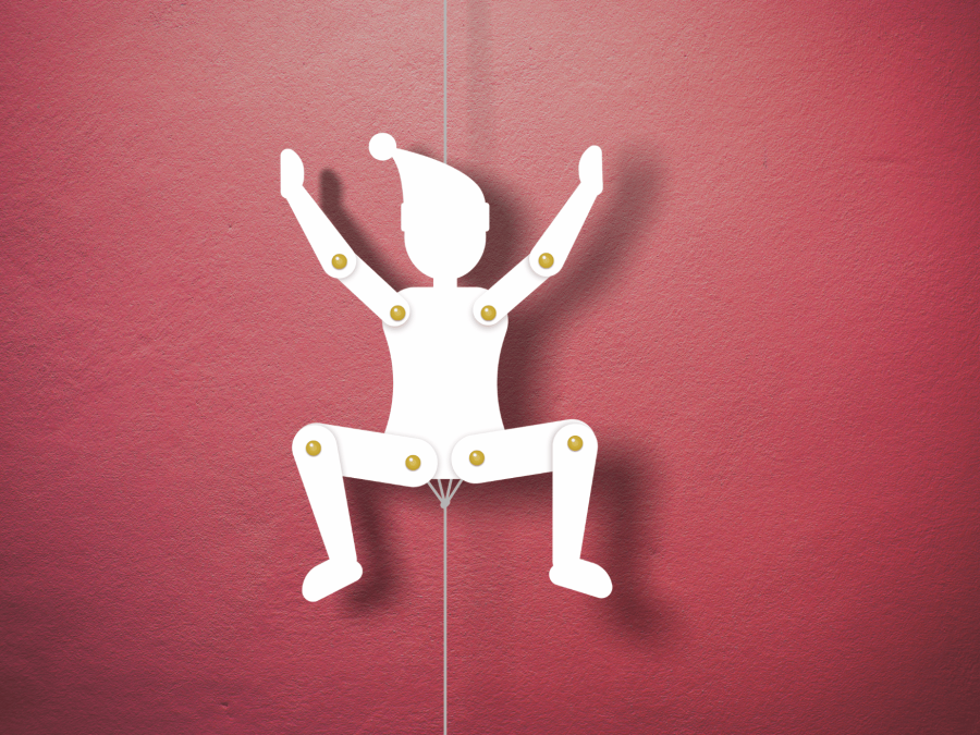 A white jumping jack silhouette with a santa hat, against a red wall.